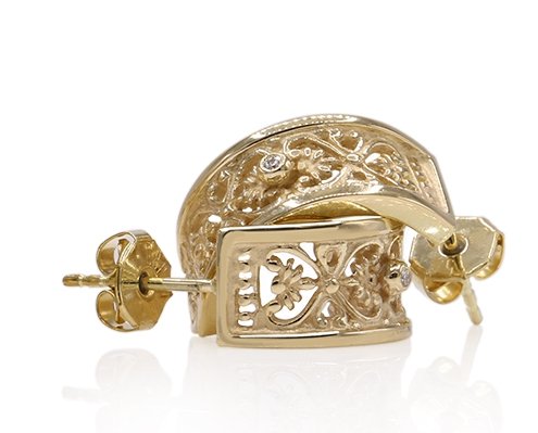 handgemaakte oorbellen uit goud en diamanten