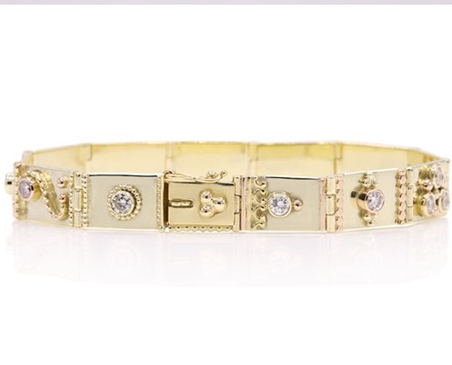 handgemaakte aparte en bijzondere armband uit goud en diamanten