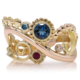 handgemaakte aparte gouden ring met topaas diamanten en robijn