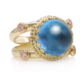 handgemaakte bijzondere gouden ring met blauwe topaas