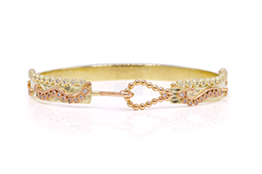 AB-1031-Armband-van-geel–en-roodgoud-bezet-met-diamanten-overview