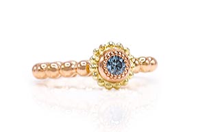 LLR-10301-Ring-gemaakt-van-geel–en-roodgoud-met-een-blauwe-diamant-overview