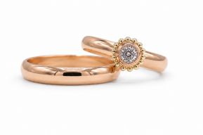 TR-1470 Set trouwringen gemaakt van roodgoud met diamant en geelgouden bolletjes Overview